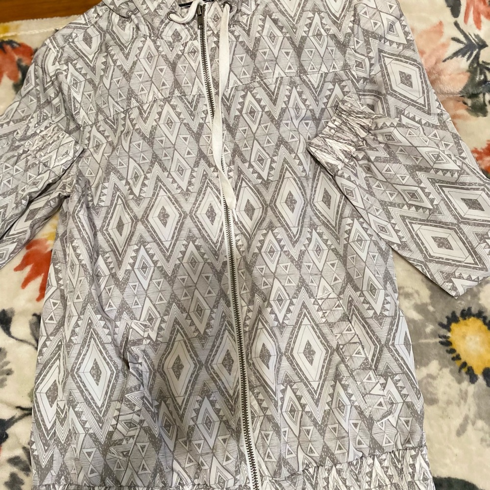 Zip up tribal windbreaker